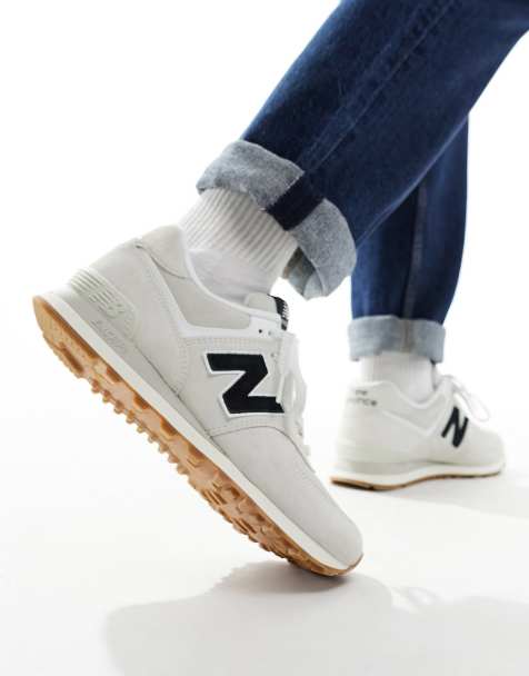 New Balance 574 sneakers in triple white with gum sole