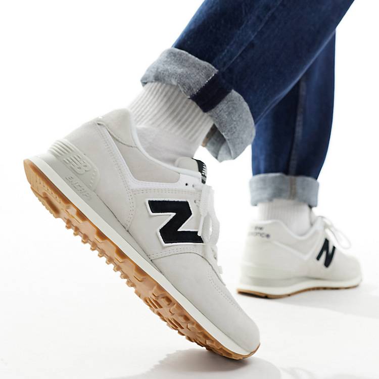 New Balance 574 sneakers in white with black detail | ASOS