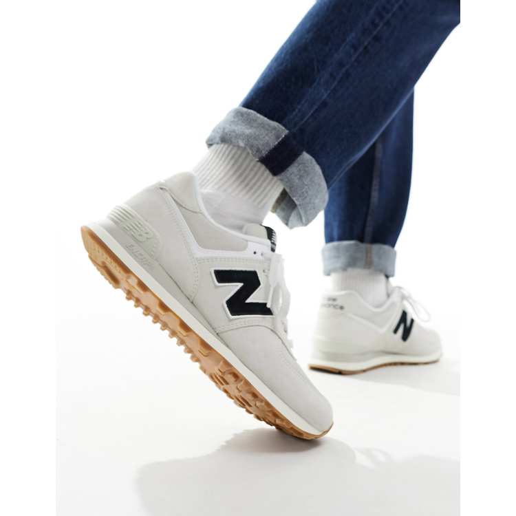 New Balance 574 sneakers in white with black detail | ASOS