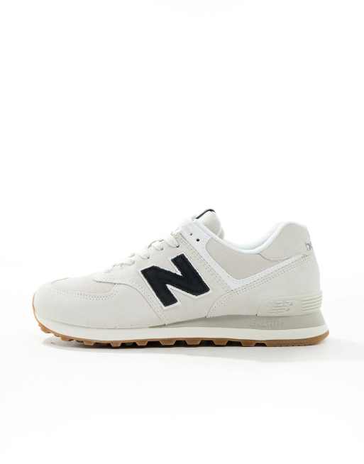 New Balance 574 sneakers in white with black detail