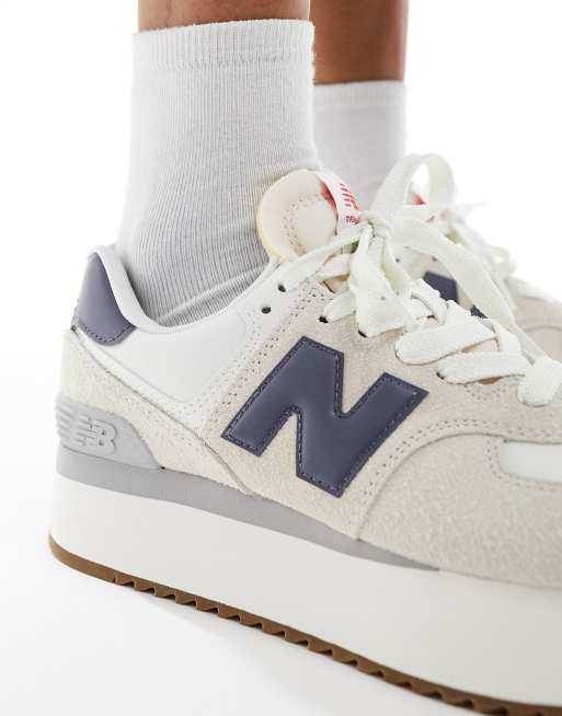 New Balance 574 sneakers in white with navy detail | ASOS