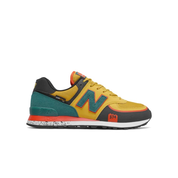 New Balance 574 sneakers in yellow and black ASOS