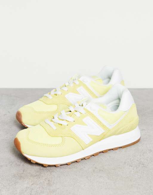 New Balance 574 sneakers in yellow and white | ASOS