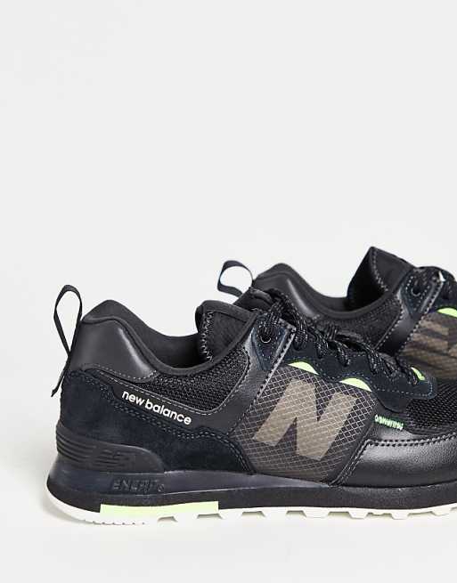 New Balance - 574 - Sneakers nere e fluo New Balance - 574 - Sneakers nere e fluo