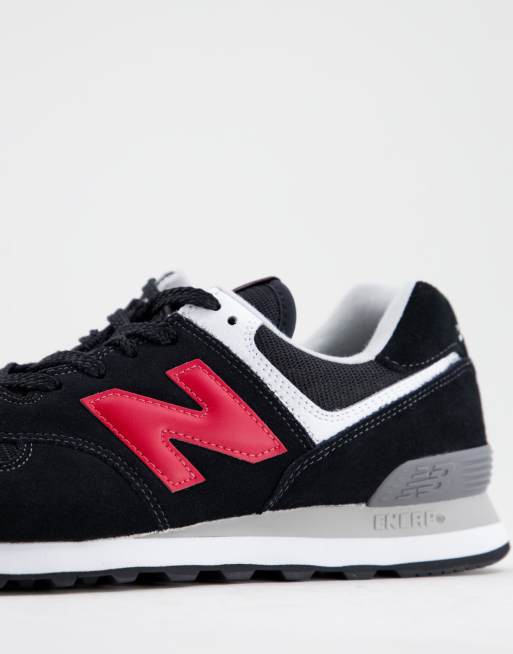 New Balance 574 trainers in black and red