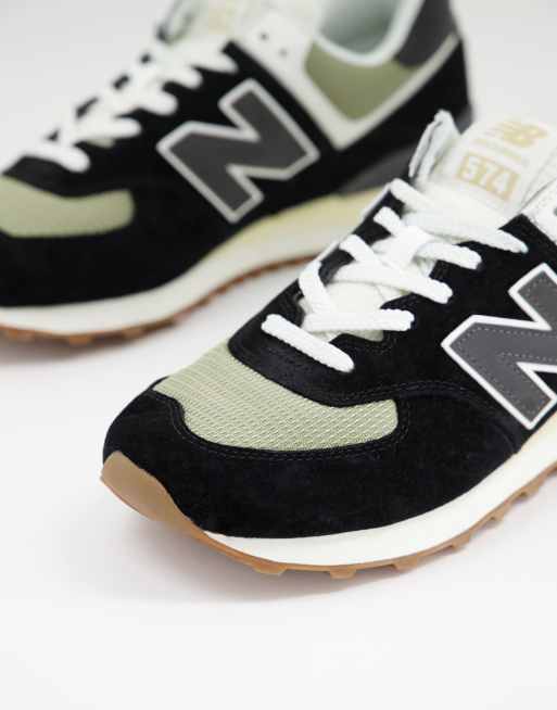 New Balance 574 trainers in black and silver