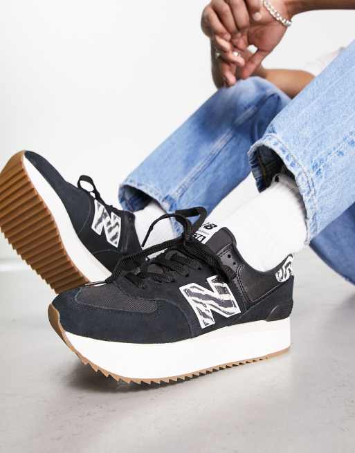 New Balance 574+ trainers in black animal print ASOS