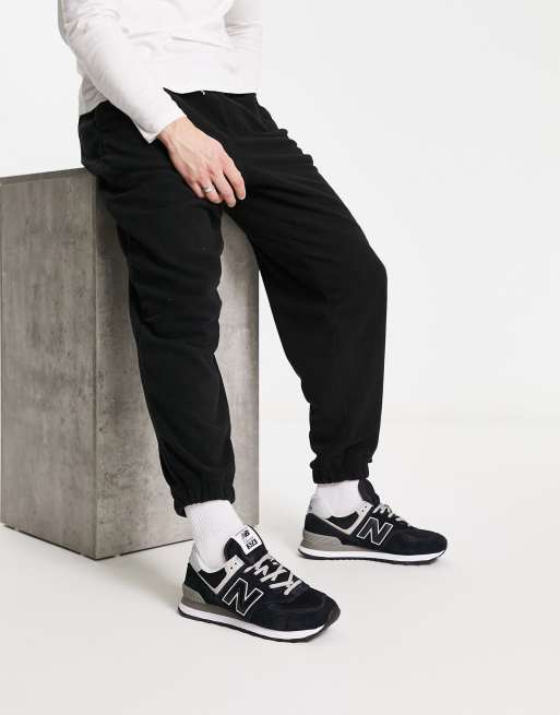 New Balance 574 trainers in black ASOS