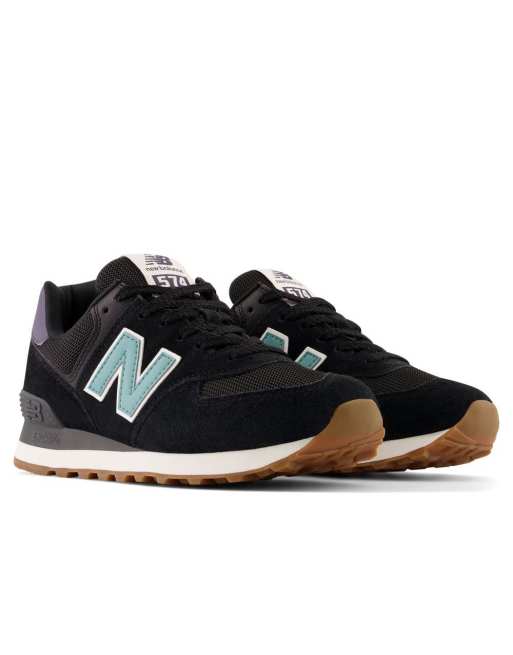 New balance black & green store 574 trainers