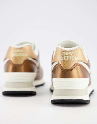 new balance 574 bronze metallic trainers