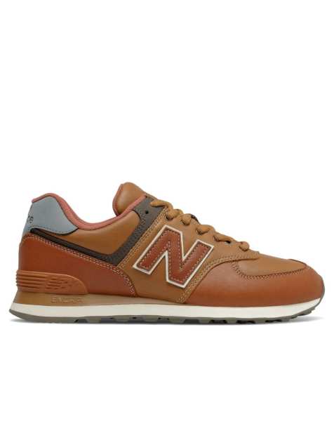 New Balance 574 trainers in burnt orange - view 1