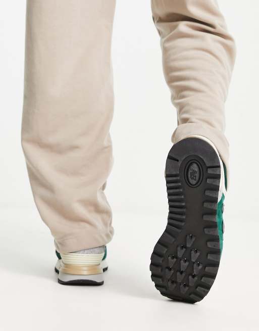 New Balance 574 trainers in dark green and off white, 2 of 4