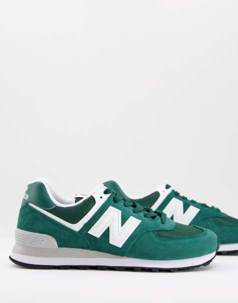 New Balance 574 trainers in deep green and white - view 1