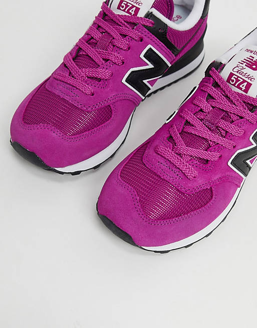New Balance 574 trainers in fuchsia and black