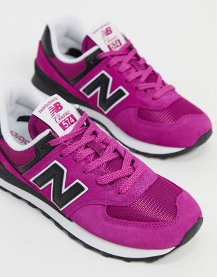 New Balance 574 trainers in fuchsia and 