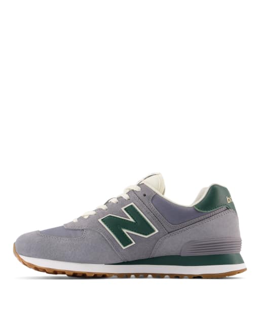 New Balance 574 trainers in grey and green