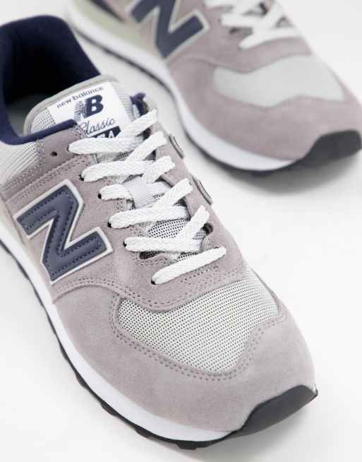 New Balance 574 trainers in grey and navy