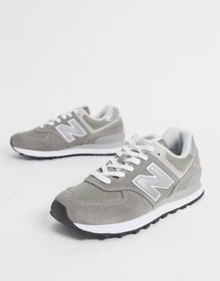 New Balance 574 trainers in khaki and 