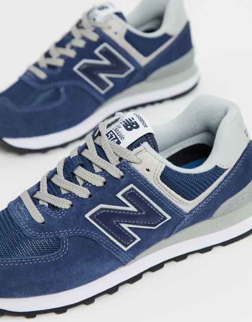 New Balance 574 trainers in navy and grey