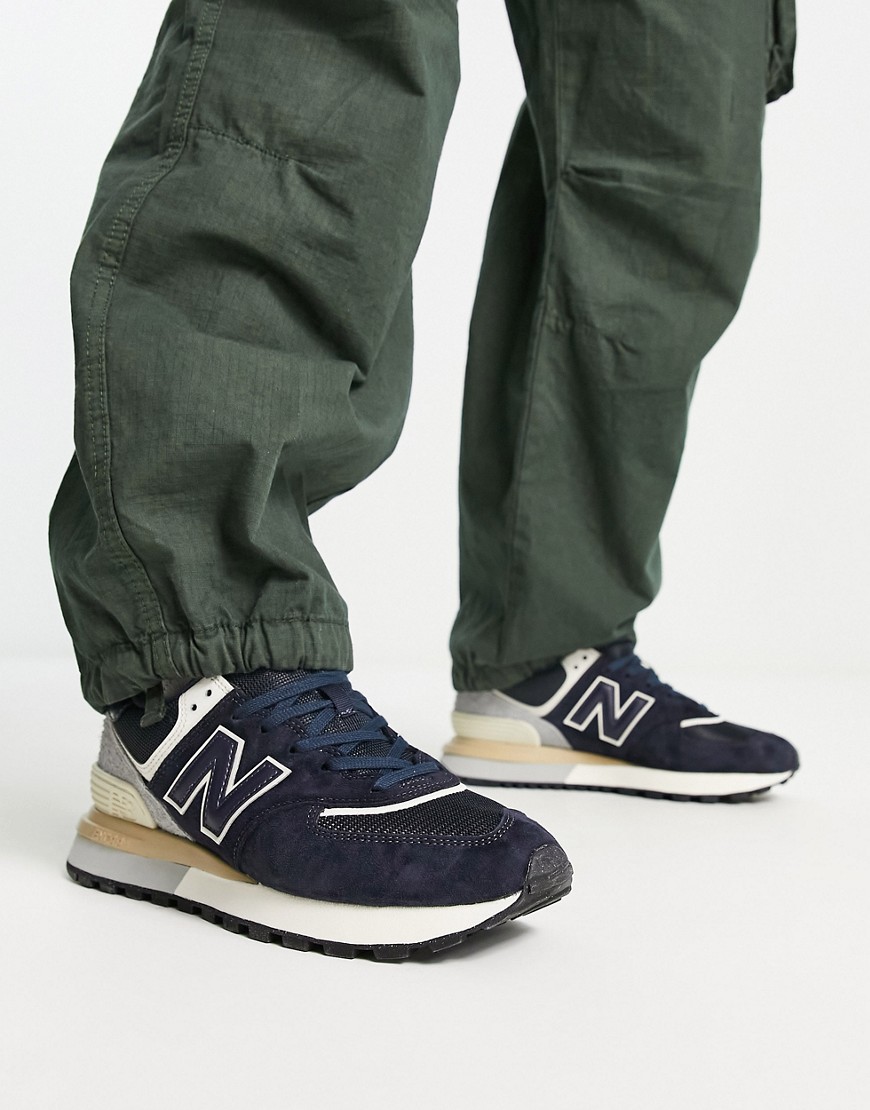 New Balance 574 trainers in navy and off white