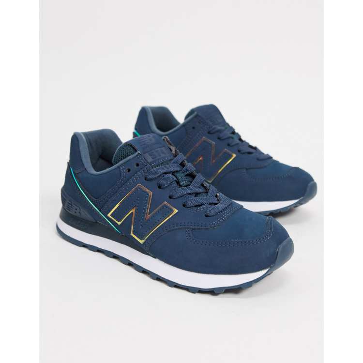 New Balance 574 trainers in navy with iridescent piping ASOS