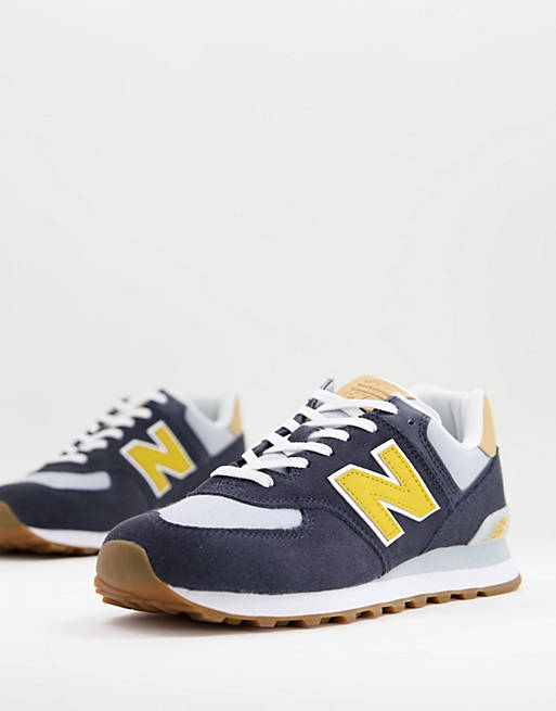 New Balance 574 trainers in navy/yellow | ASOS