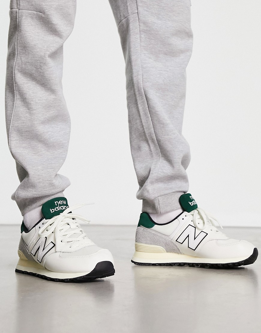 New Balance 574 trainers in off white and dark green