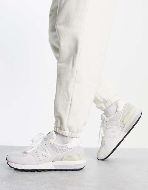 New Balance 574 trainers in off white and grey