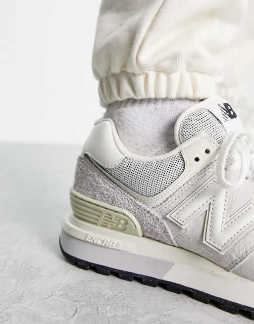 New Balance 574 trainers in off-white with grey detail