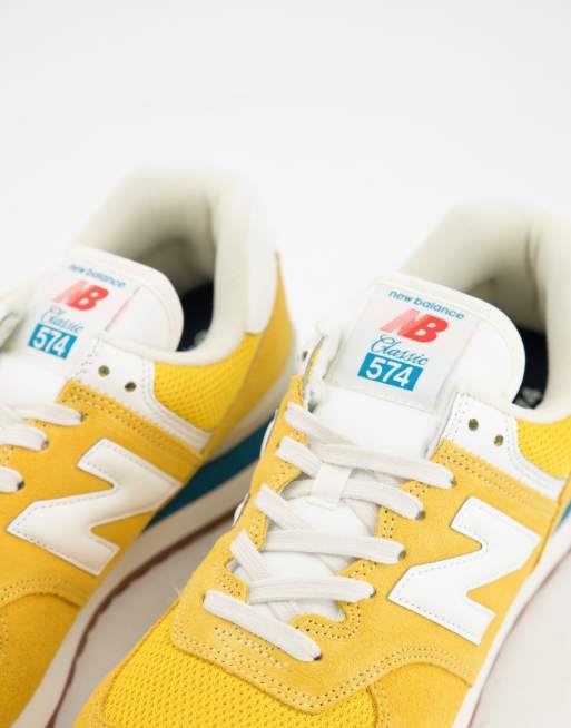 New Balance 574 trainers in yellow