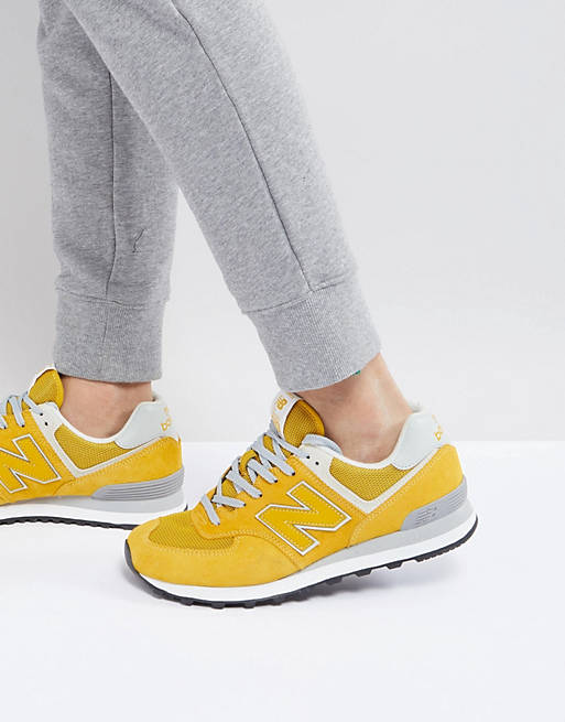 New Balance 574 trainers in yellow