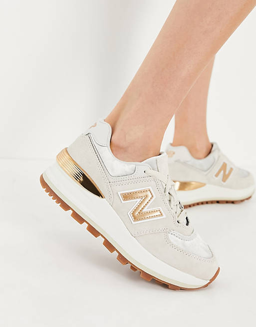 New Balance 574 wedge trainers in beige/gold