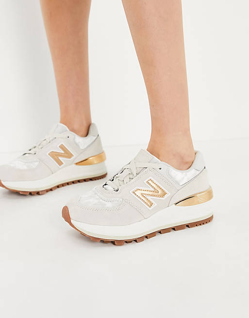 New Balance 574 wedge trainers in beige/gold