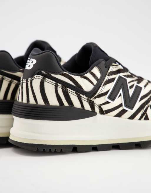 New Balance 574 wedge trainers in zebra print