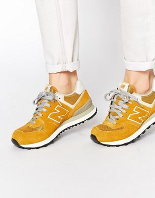 new balance 574 yellow suede trainers
