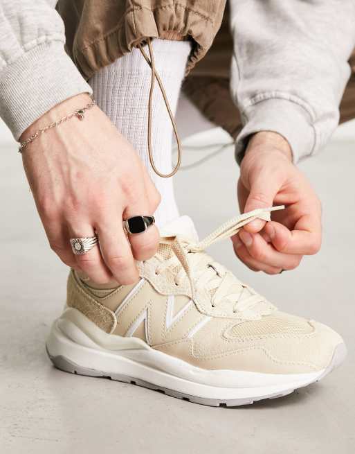 New balance store tan sneakers