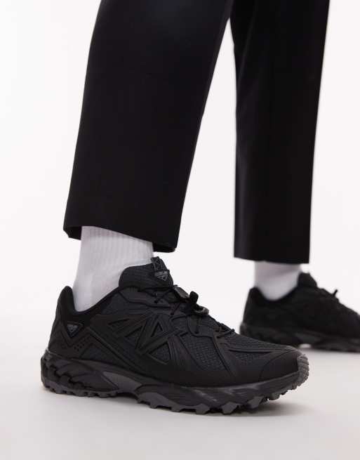 New Balance 610 Schwarze Sneaker