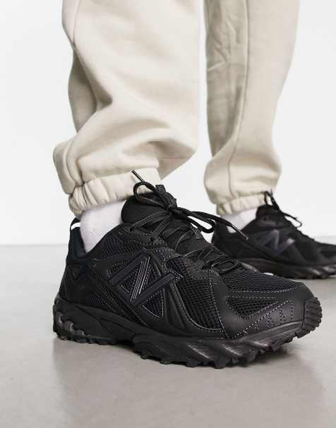 New Balance 610 trainers in triple black