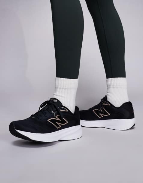 New Balance - 680 - Hardloopschoenen in zwart en wit - view 1