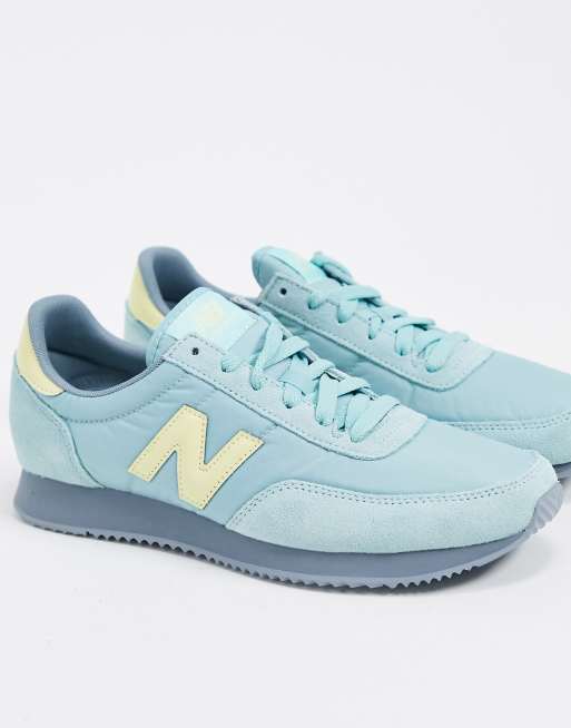 New Balance 720 trainers in blue and yellow ASOS