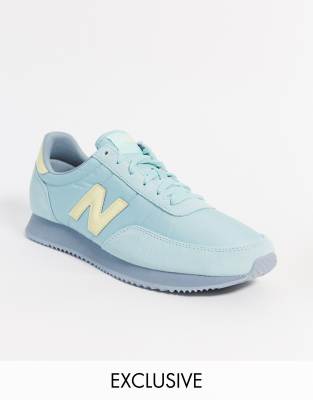 New Balance 720 trainers in blue/yellow exclusive at ASOS