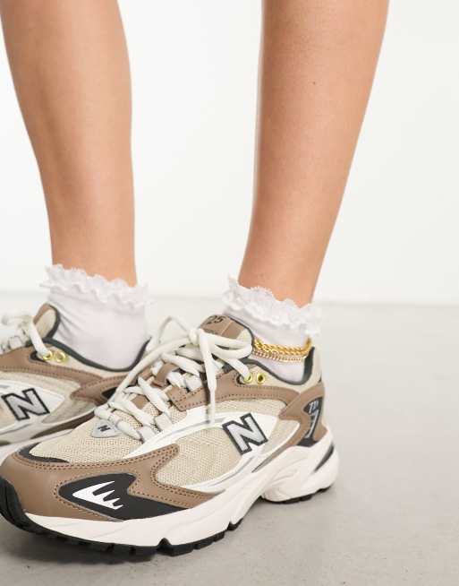 New balance 711 clearance dames bruin