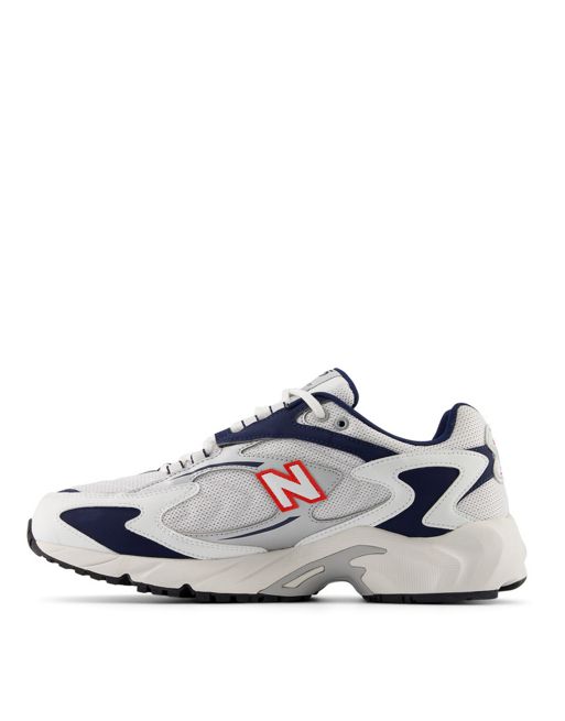 New Balance 725 sneakers in white with red and blue detail | ASOS