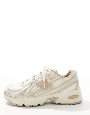New Balance 740 trainers in beige and tan
