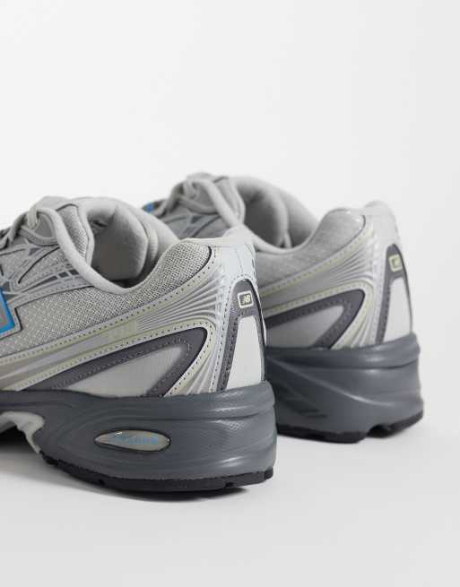 New Balance 740 sneakers in gray and blue, 2 of 5