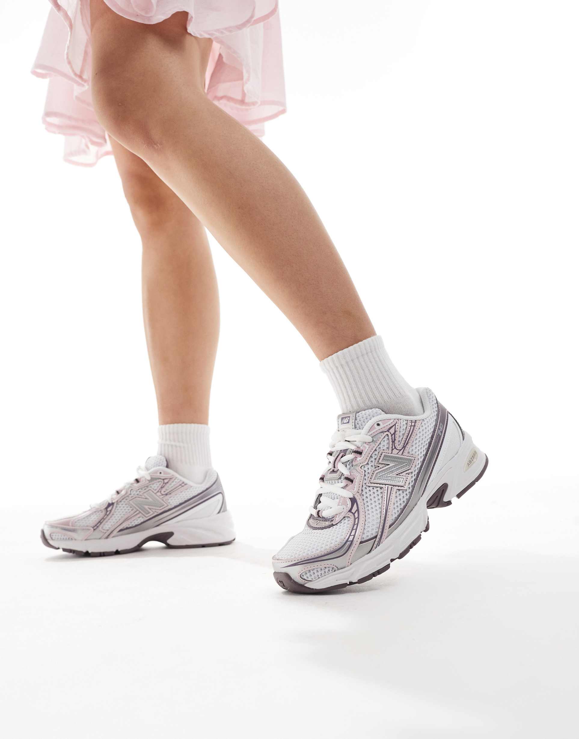 new balance 740 sneakers in silver and pink