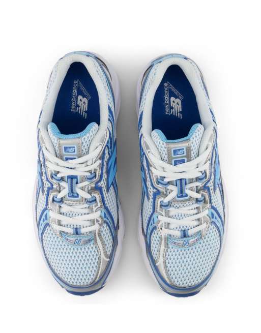 New Balance 740 trainers in white and blue