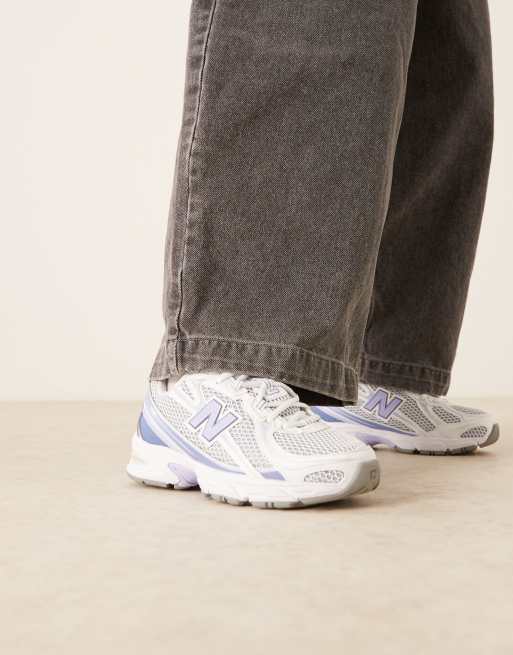 New Balance 740 sneakers in white and blue, 2 of 5