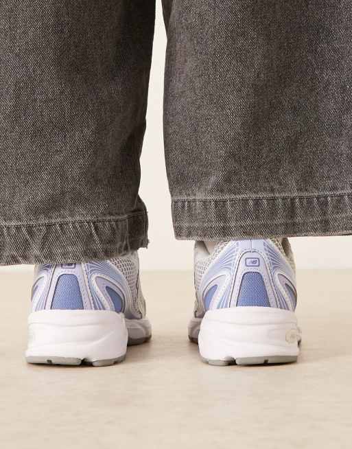 New Balance 740 sneakers in white and blue, 3 of 5