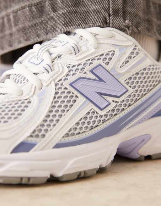 New Balance 740 sneakers in white and blue, 4 of 5